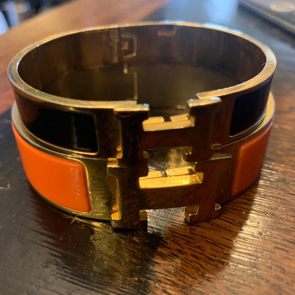 Orange black and gold bangles